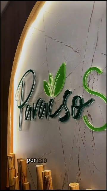 Logo de Paraíso Spa en la pared